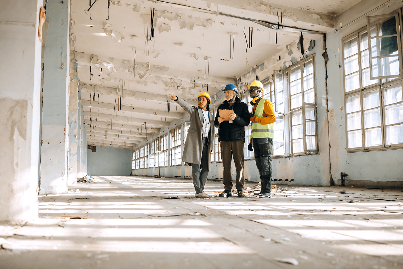 Workers assessing construction site progress